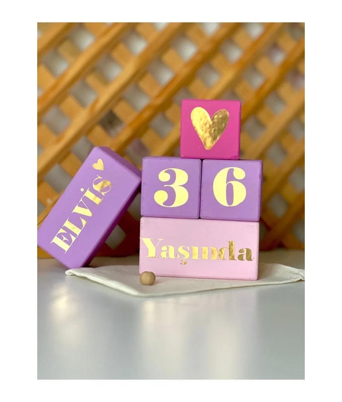Fusya mor isimli anne bebek anı küpü isimli küplü