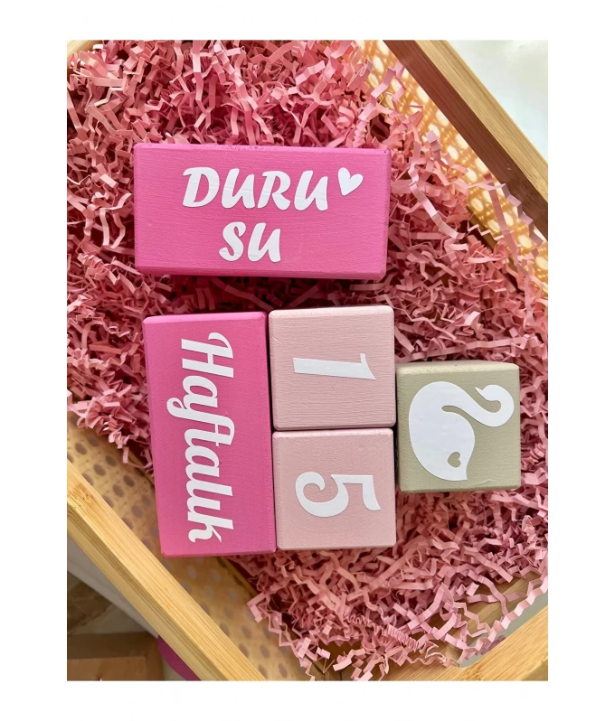 Pembe krem kuğu desenli bebek anı küpü seti